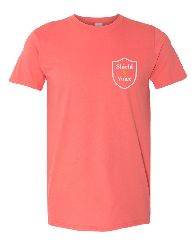 Childhood Is Not a Crime Scene Tee — Coral Silk — front pocket mark