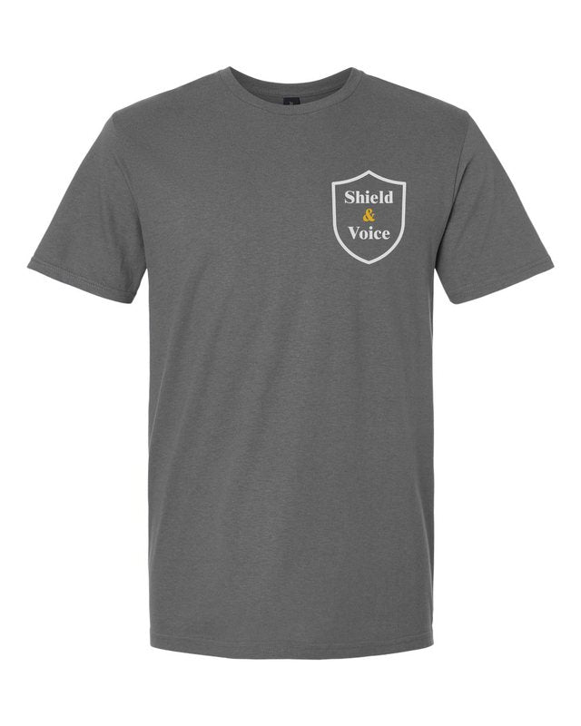 The Smallest Voices Tee — Cream & Blue — Charcoal — front pocket mark